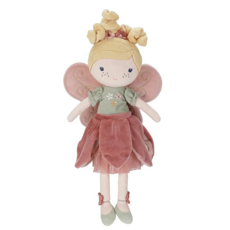 בובת פיה ורודה עומדת.